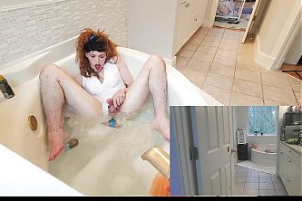 playing in the tub with a dildo